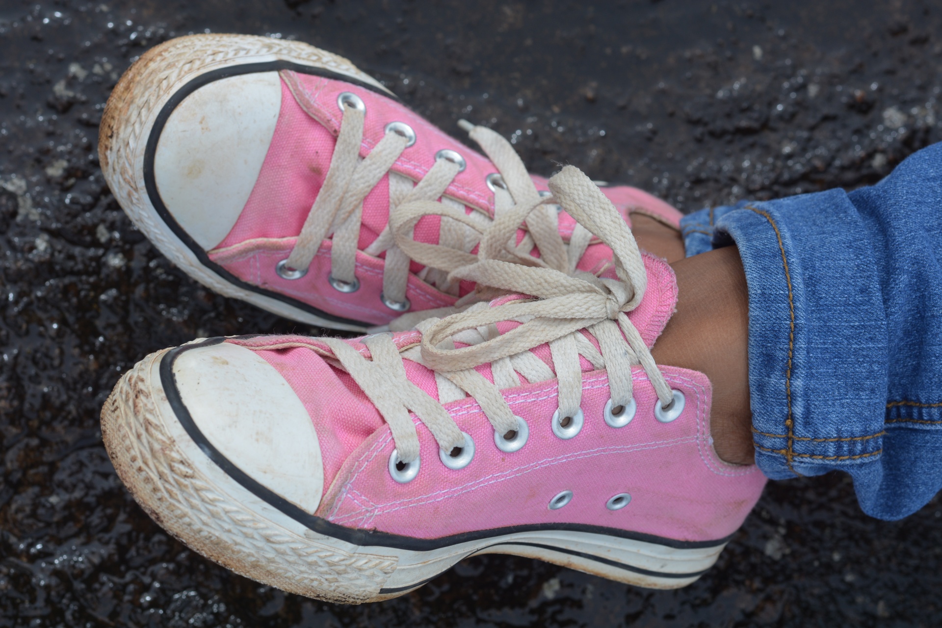 Girl shows sweaty stinky converse sneaker