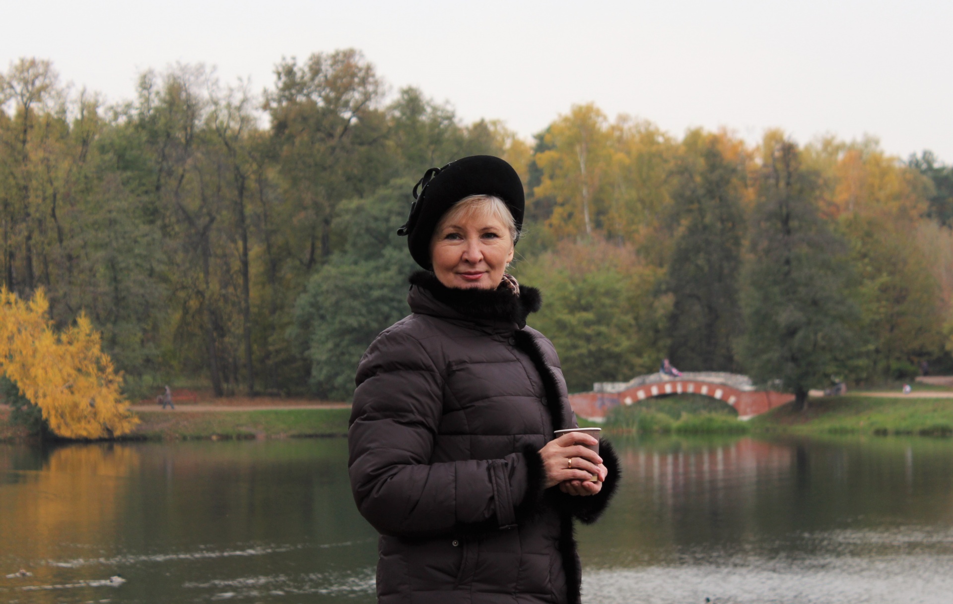 woman takes lake park free photo