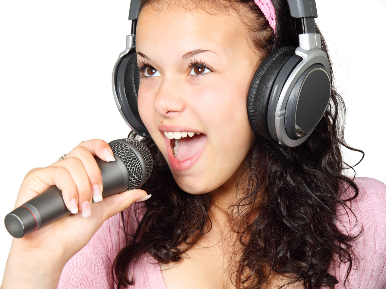 girl holding karaoke free photo