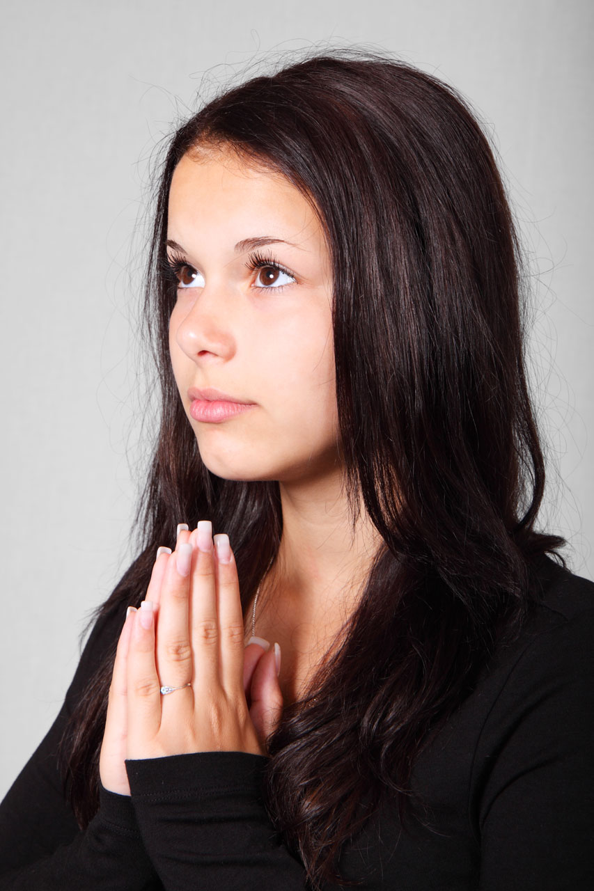 girl praying hands free photo