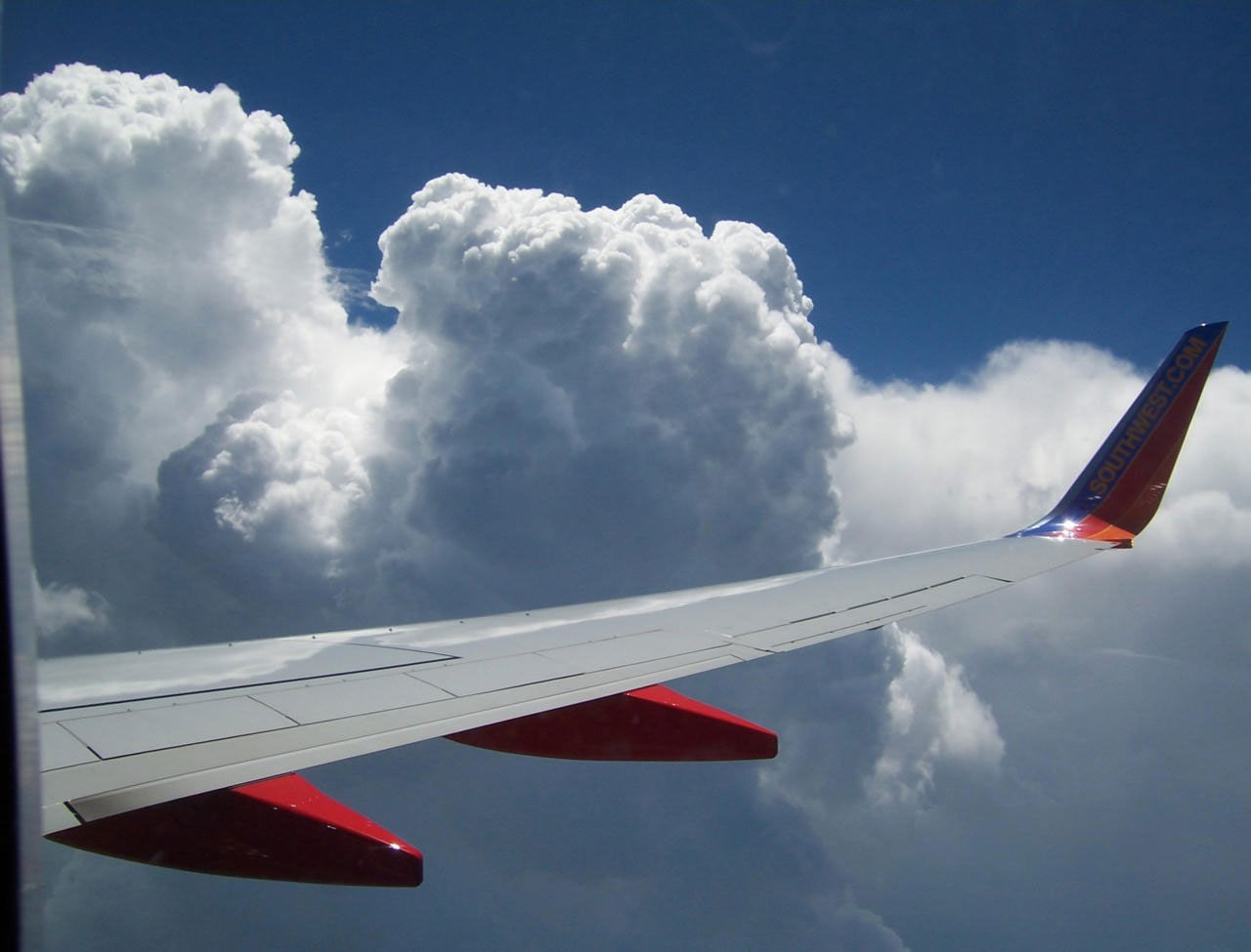 clouds above clouds from above free photo