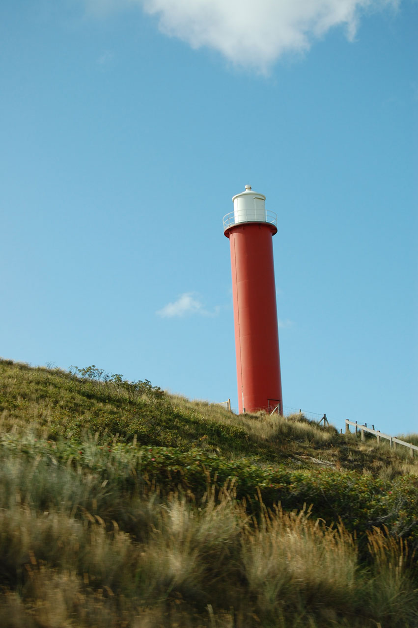 lighthouse beach sea free photo