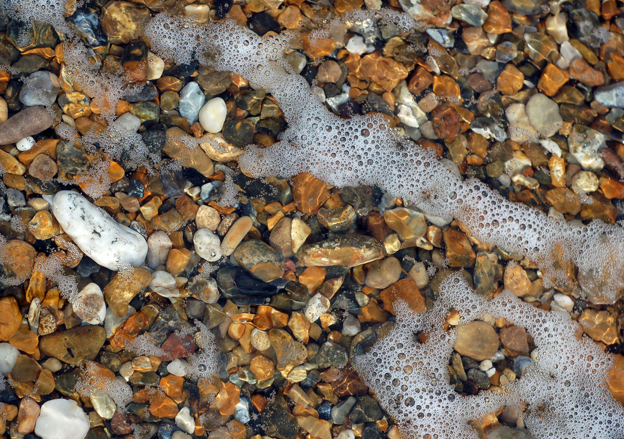 stones pebbles sea free photo