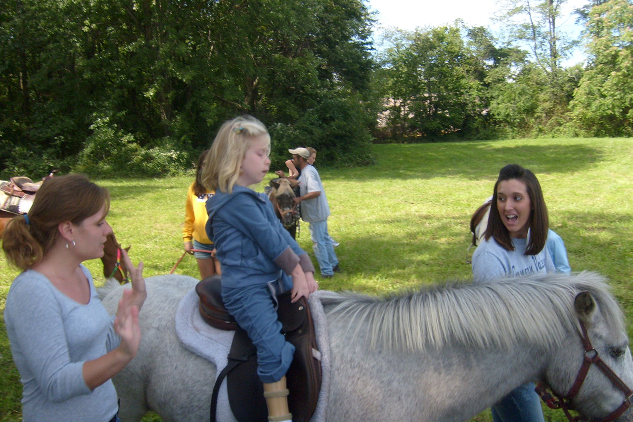 girl pony ride free photo