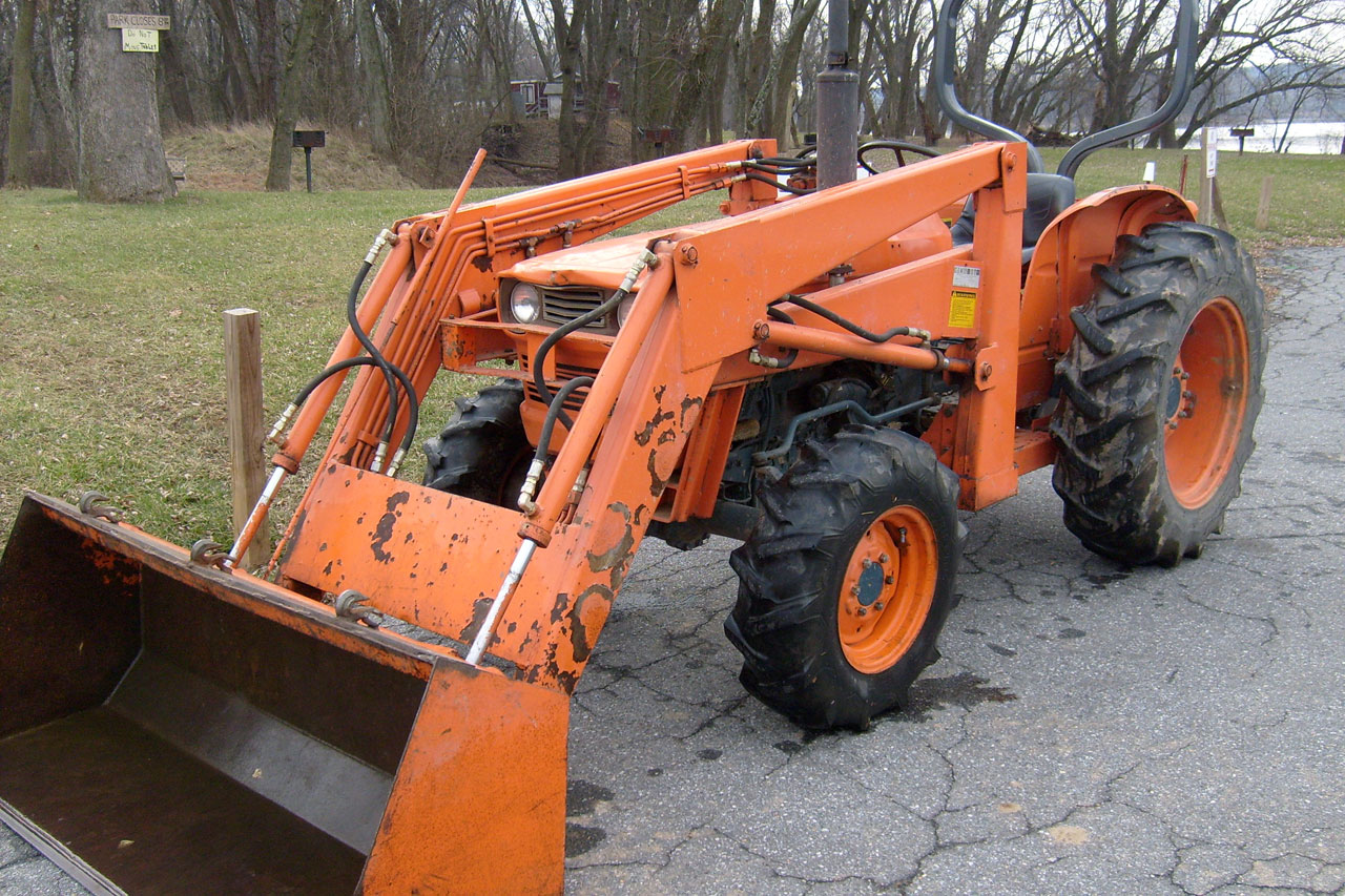 tractor orange front end loader free photo
