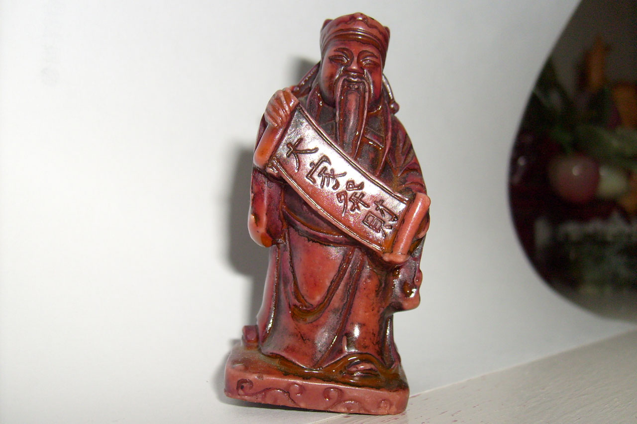 carved figurine banner free photo