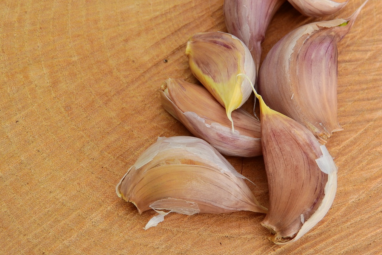 a clove of garlic garlic flavoring dishes free photo