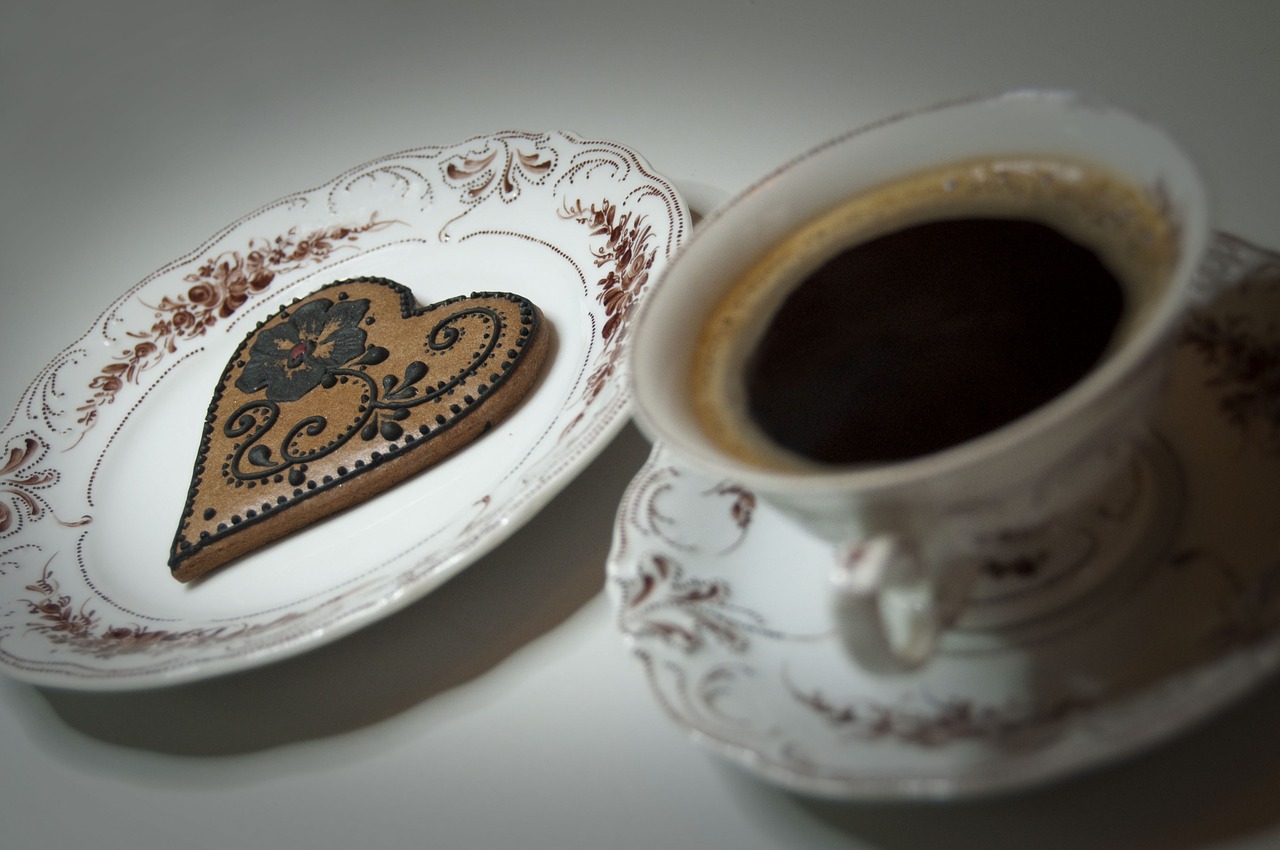 a cup of coffee porcelain the cake free photo