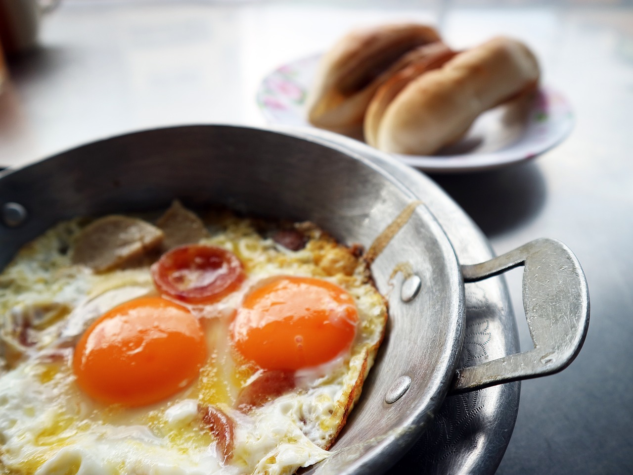 a fried egg  breakfast  food free photo