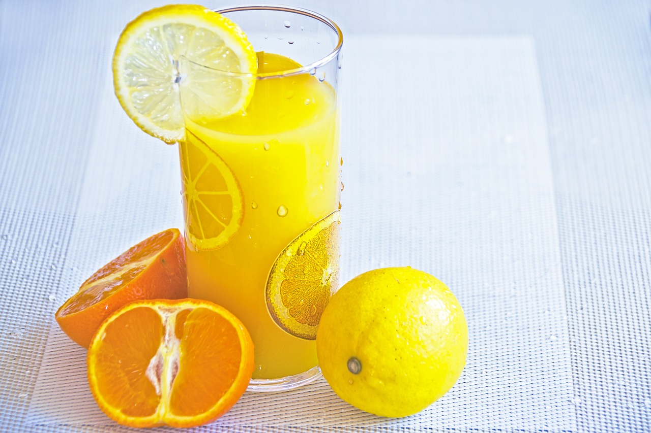 a glass of juice fruit juice juicy citrus free photo
