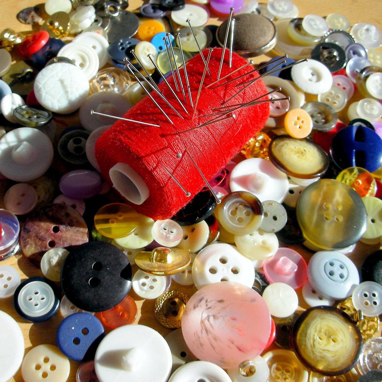 a lot buttons spool of thread free photo