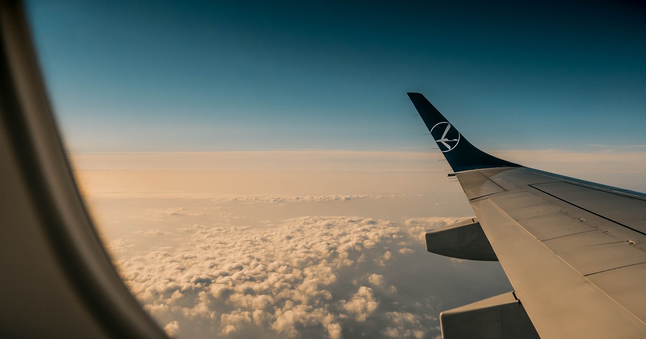 a plane clouds sky free photo