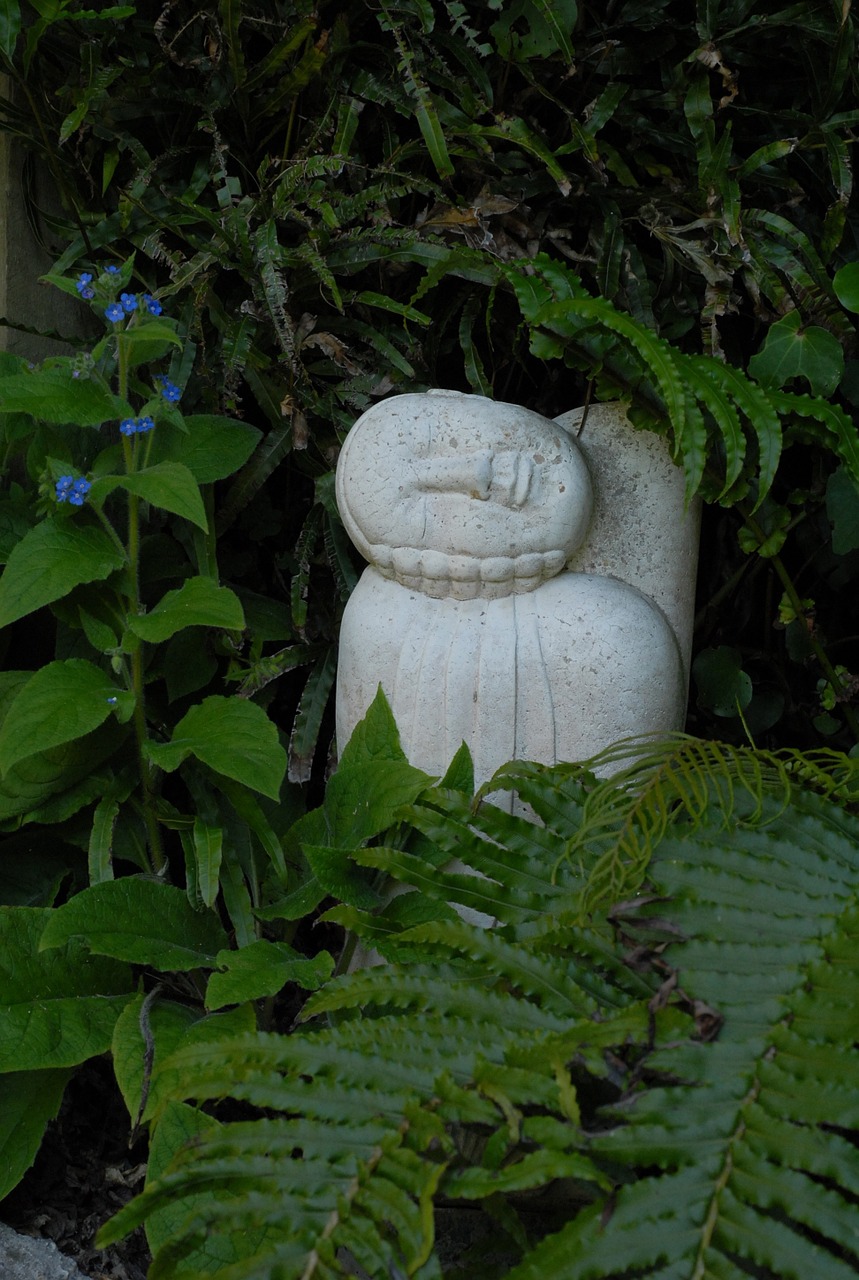 a stone garden sculpture sculpture free photo