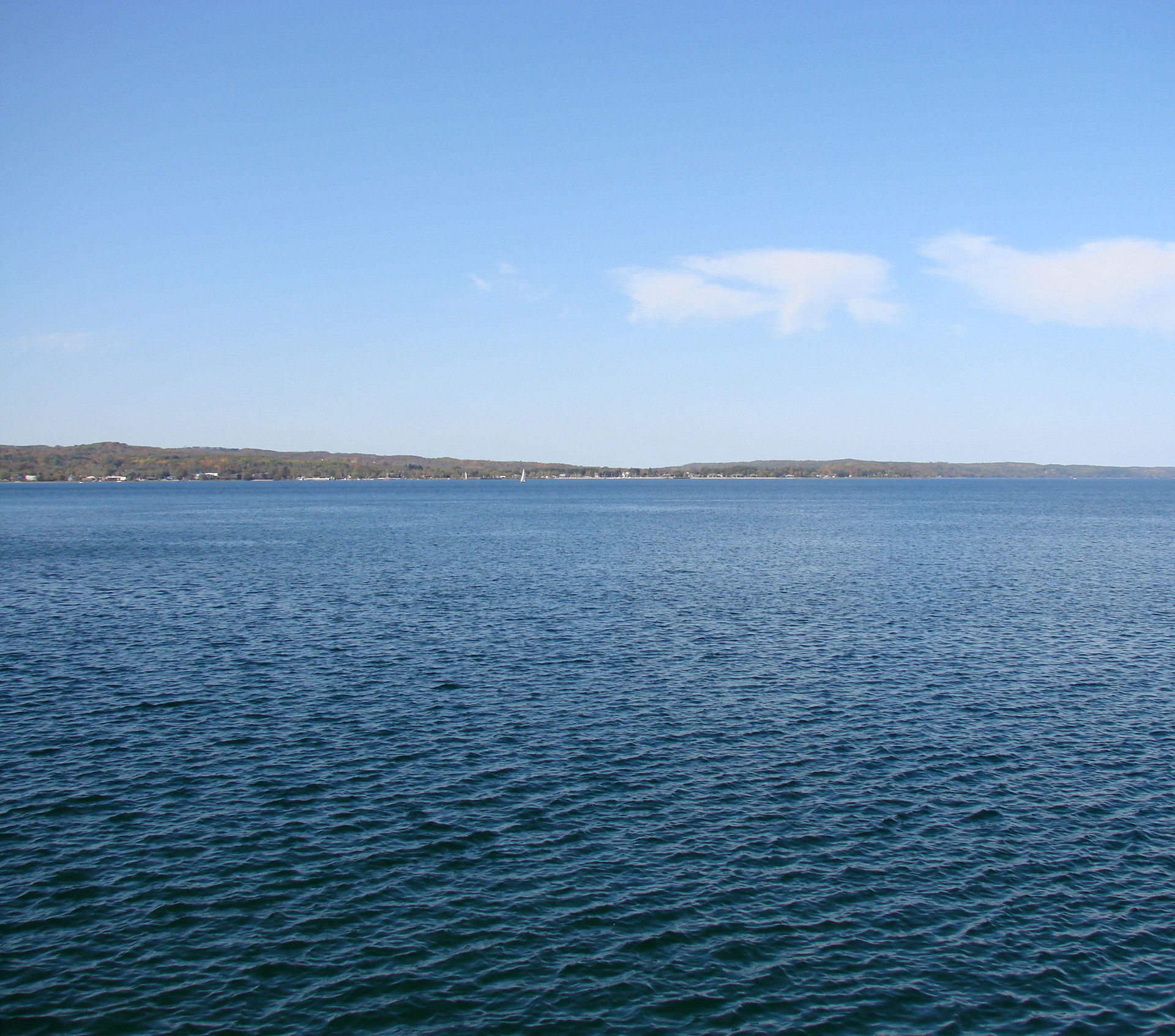 water blue shoreline distance free photo