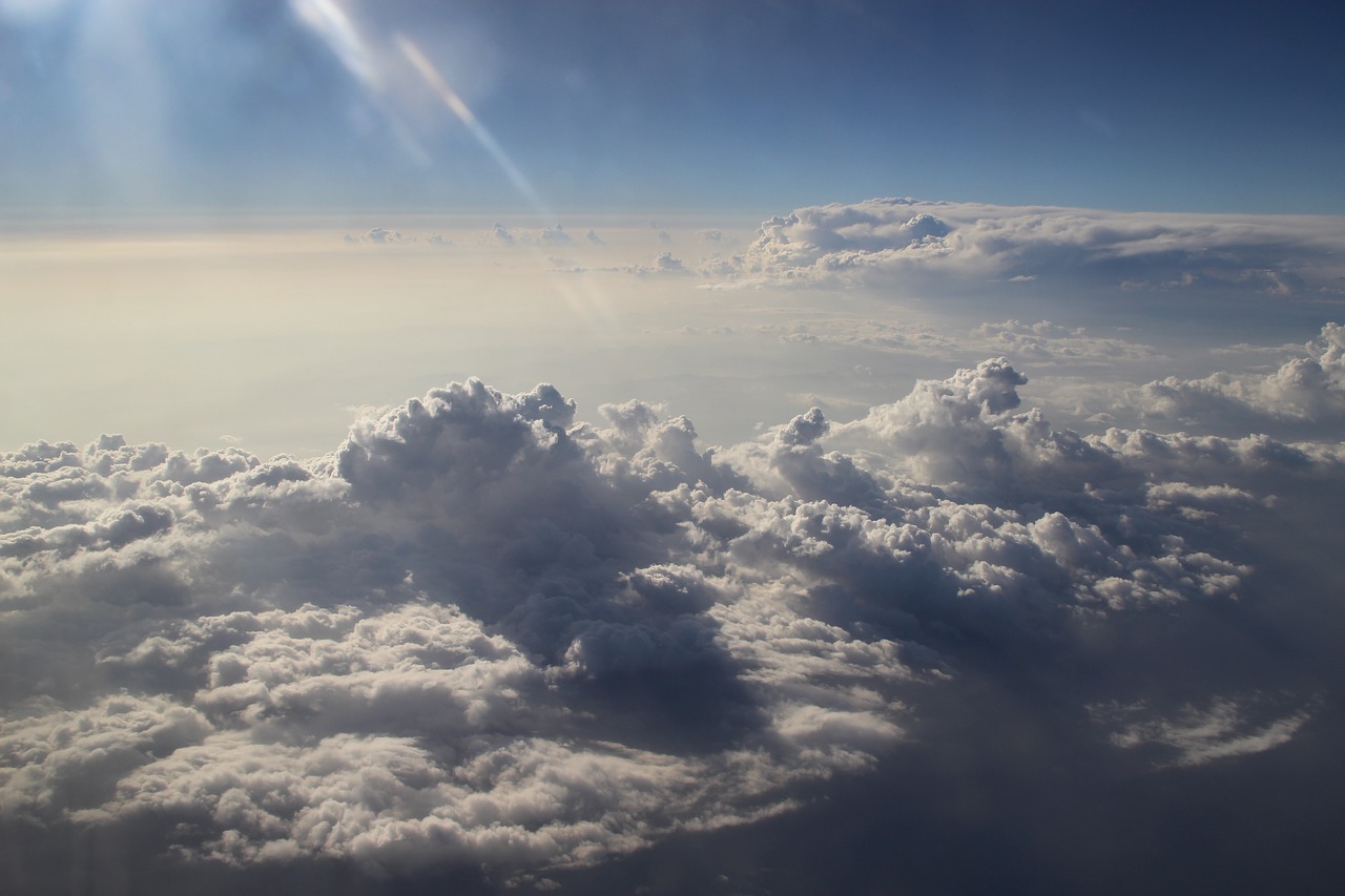 above the clouds clouds plane view free photo