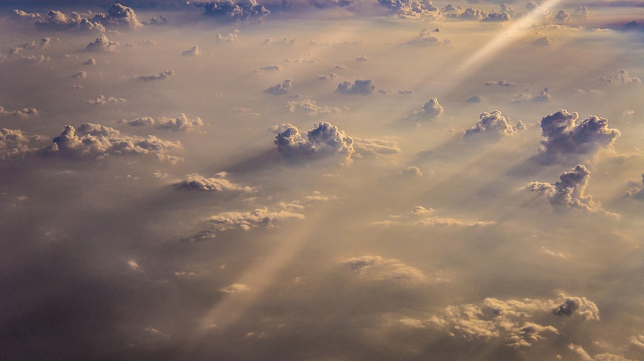 above the clouds sun rays sky free photo