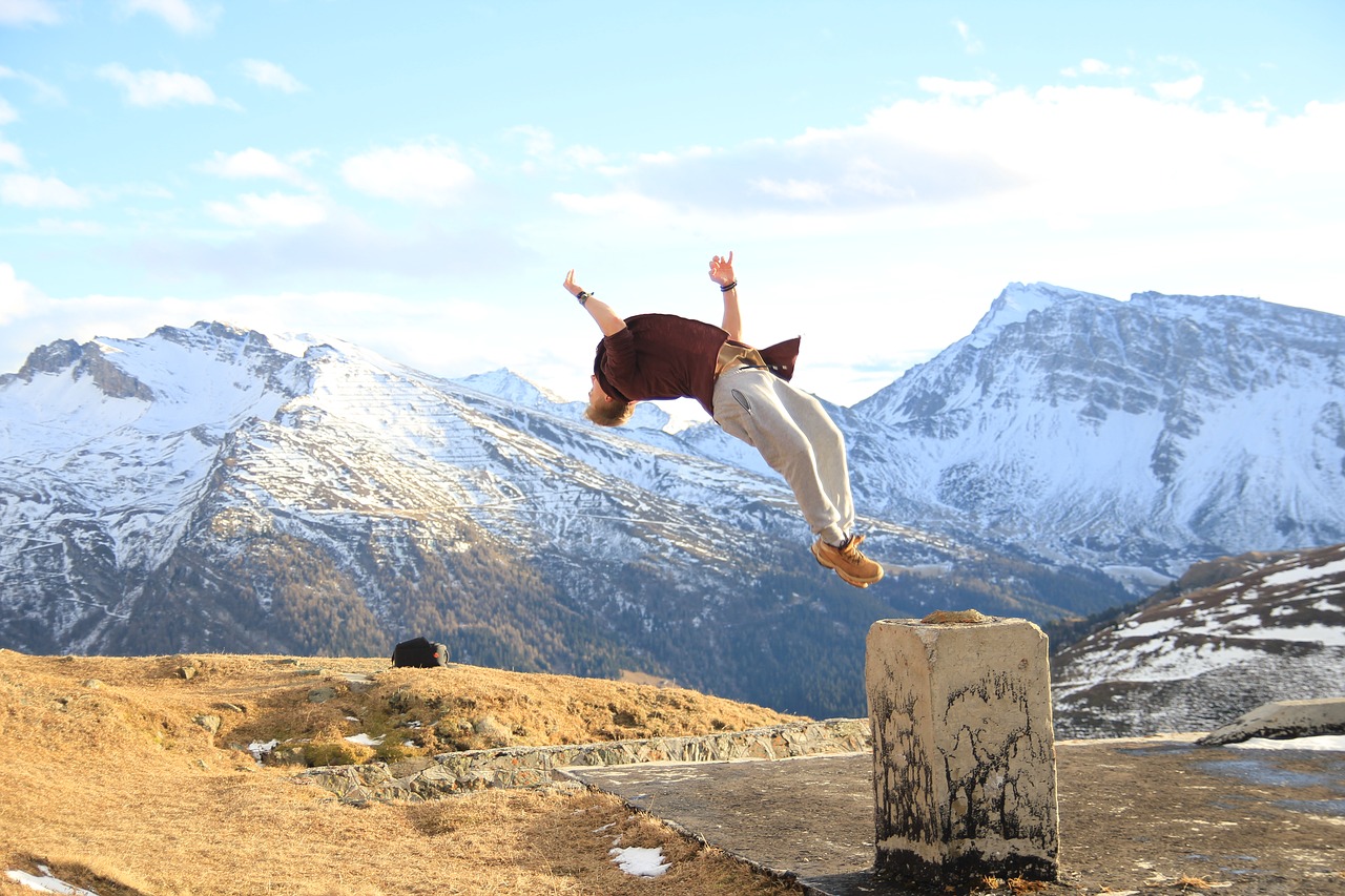 acrobatics  somersault  mountains free photo