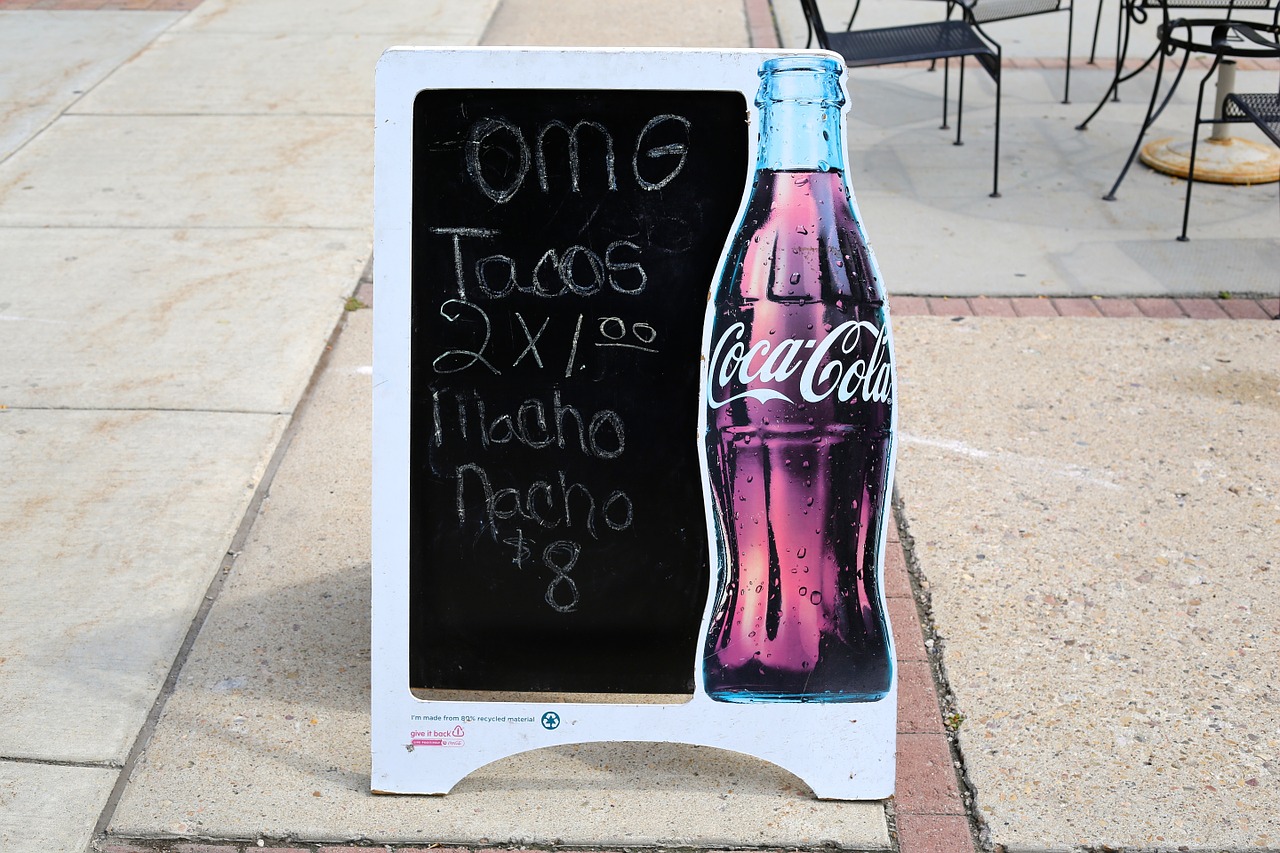 advertise sign coke free photo