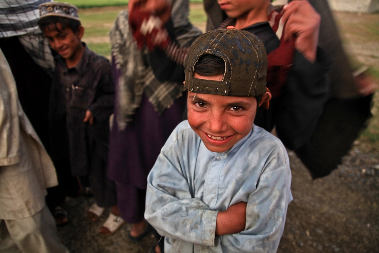 afghani child laughing free photo