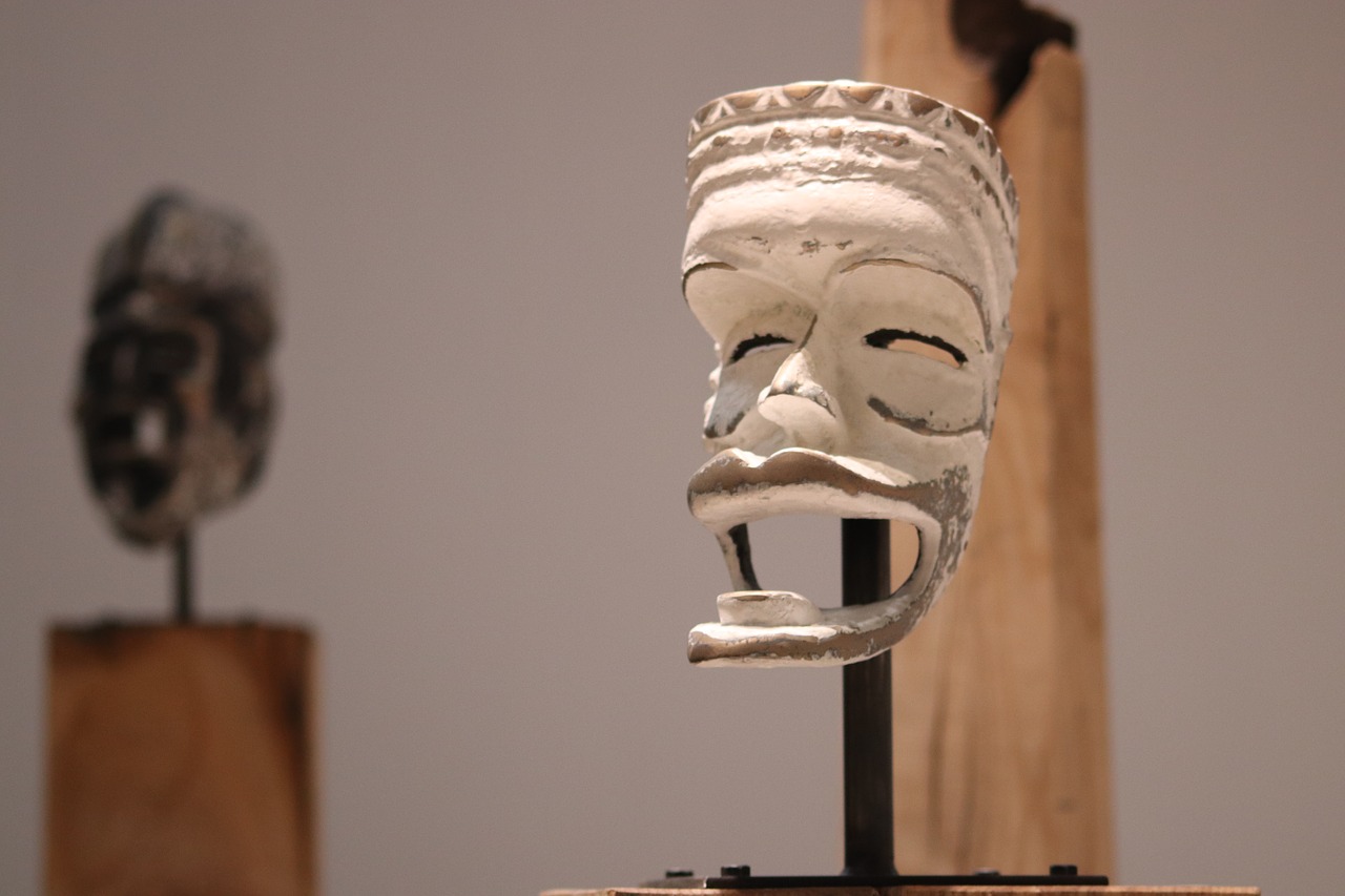 african mask  art first  white mask free photo