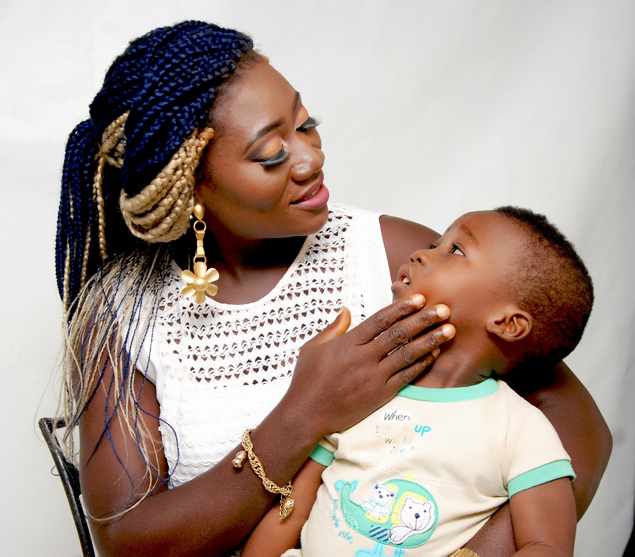 african mother and child  nigerian  family ties free photo