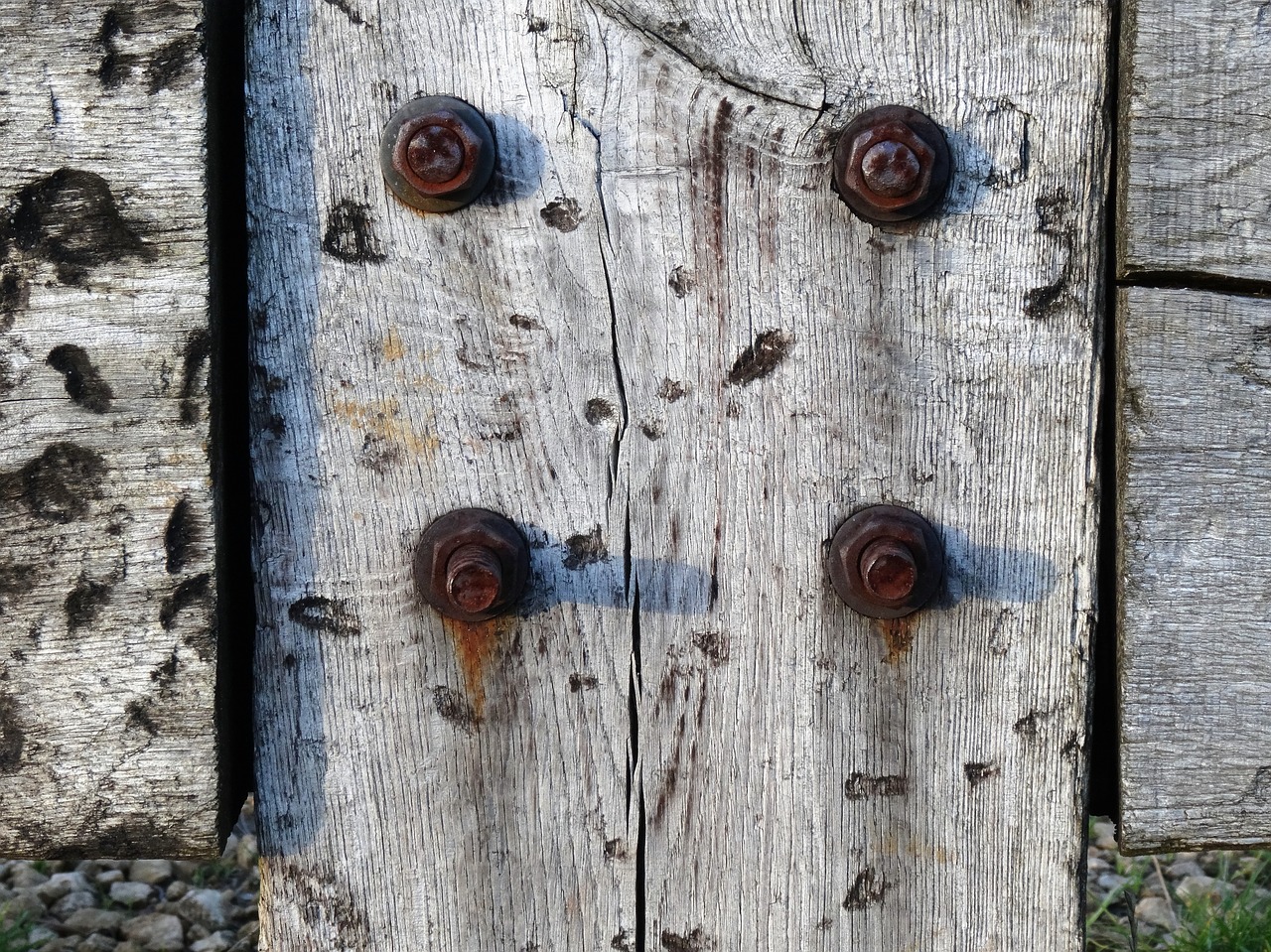 aged wood rusted bolts assembling wood and iron free photo
