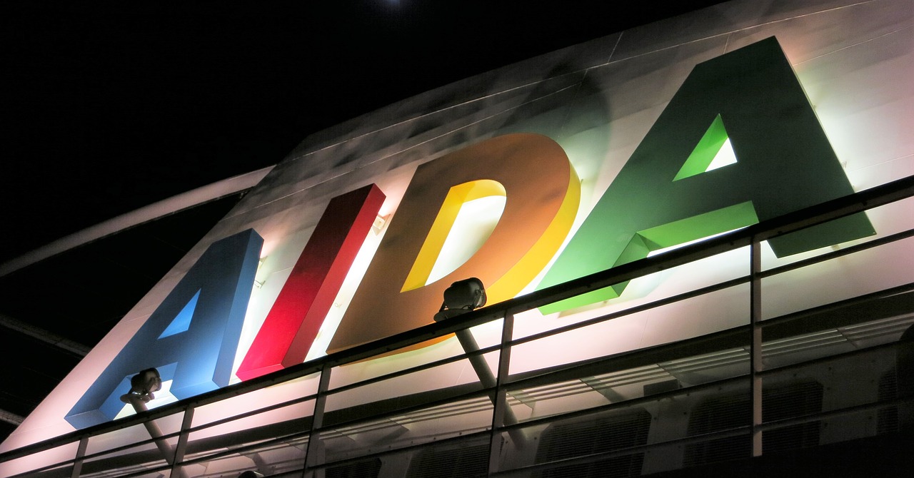 aida logo night free photo