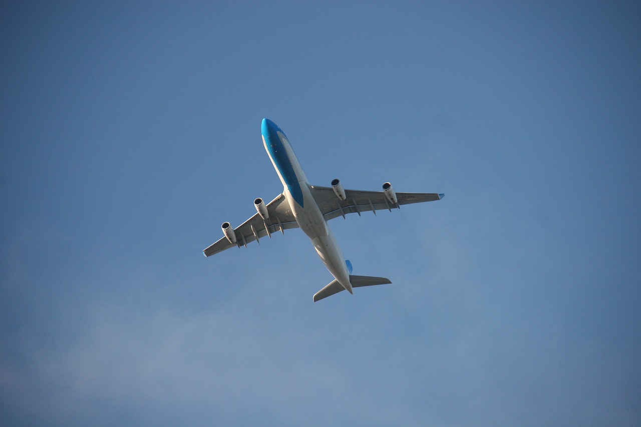 aircraft blue sky flying free photo