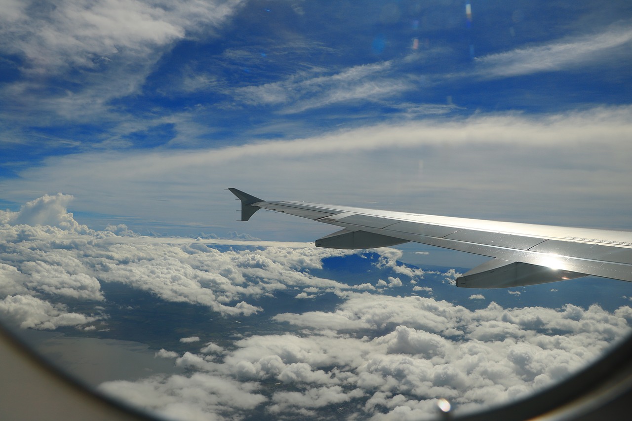 aircraft blue sky white cloud free photo