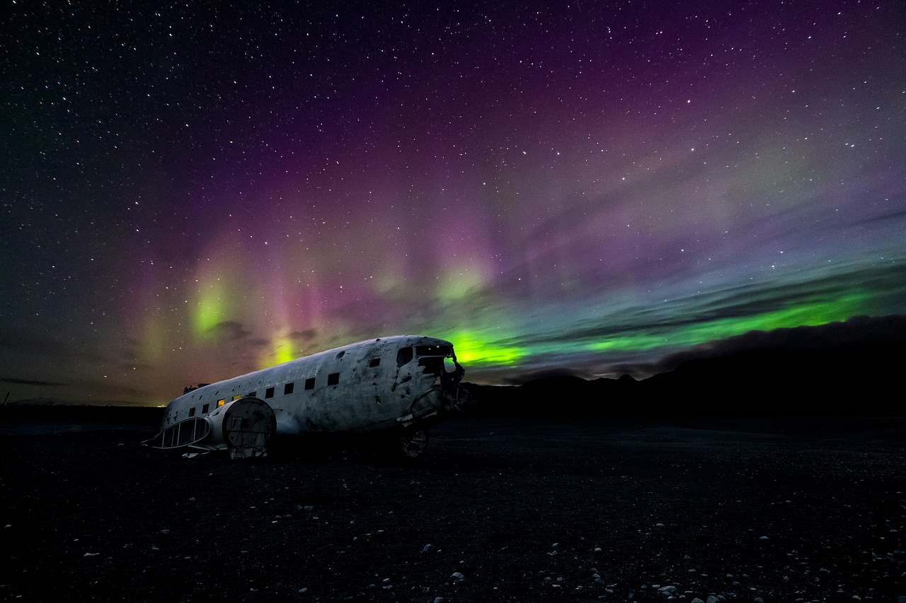 aircraft airplane aurora borealis free photo