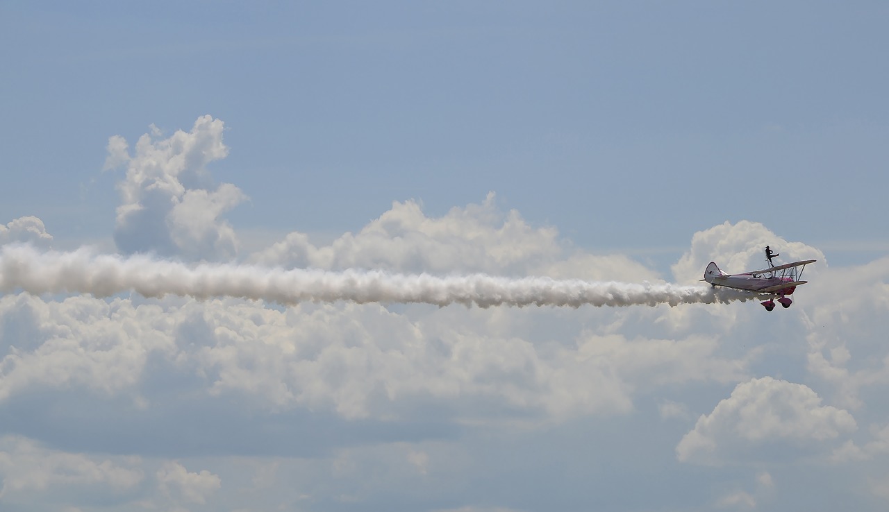 aircraft  acrobatics  clouds free photo