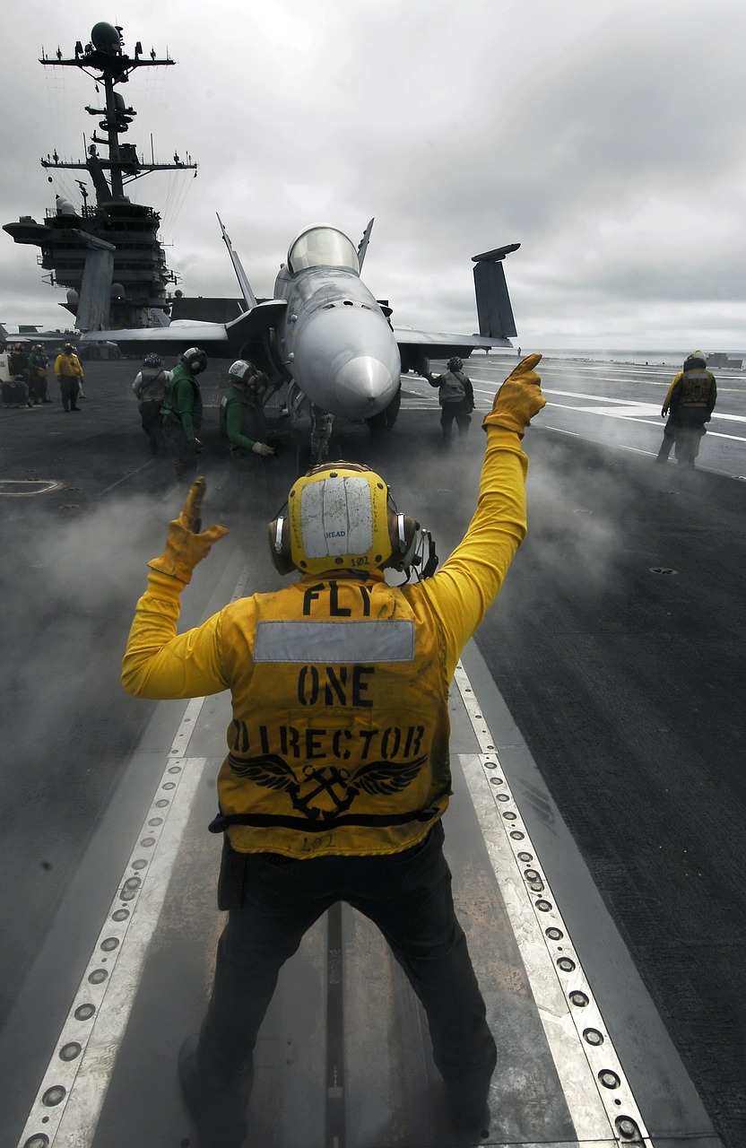aircraft carrier jet fighter flight chief free photo