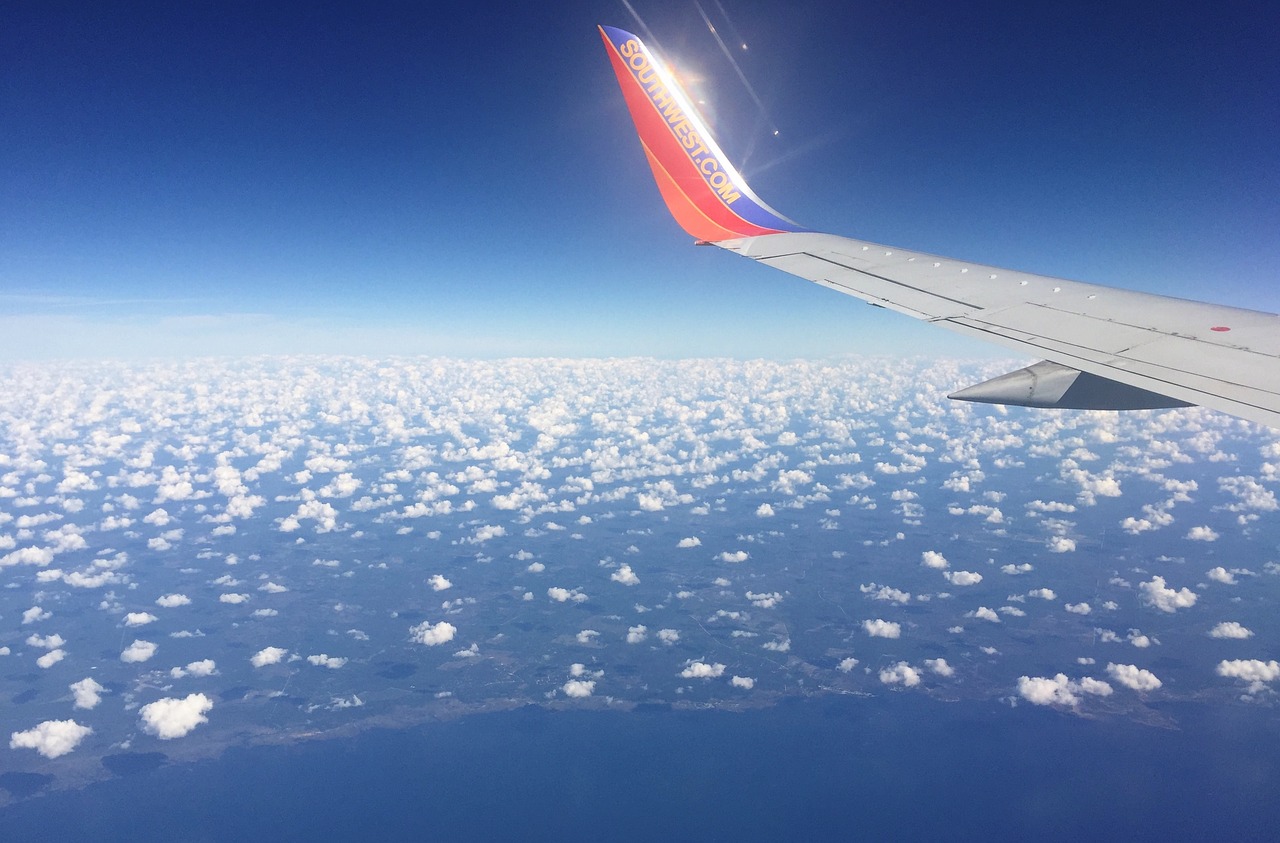 airplane clouds sky free photo