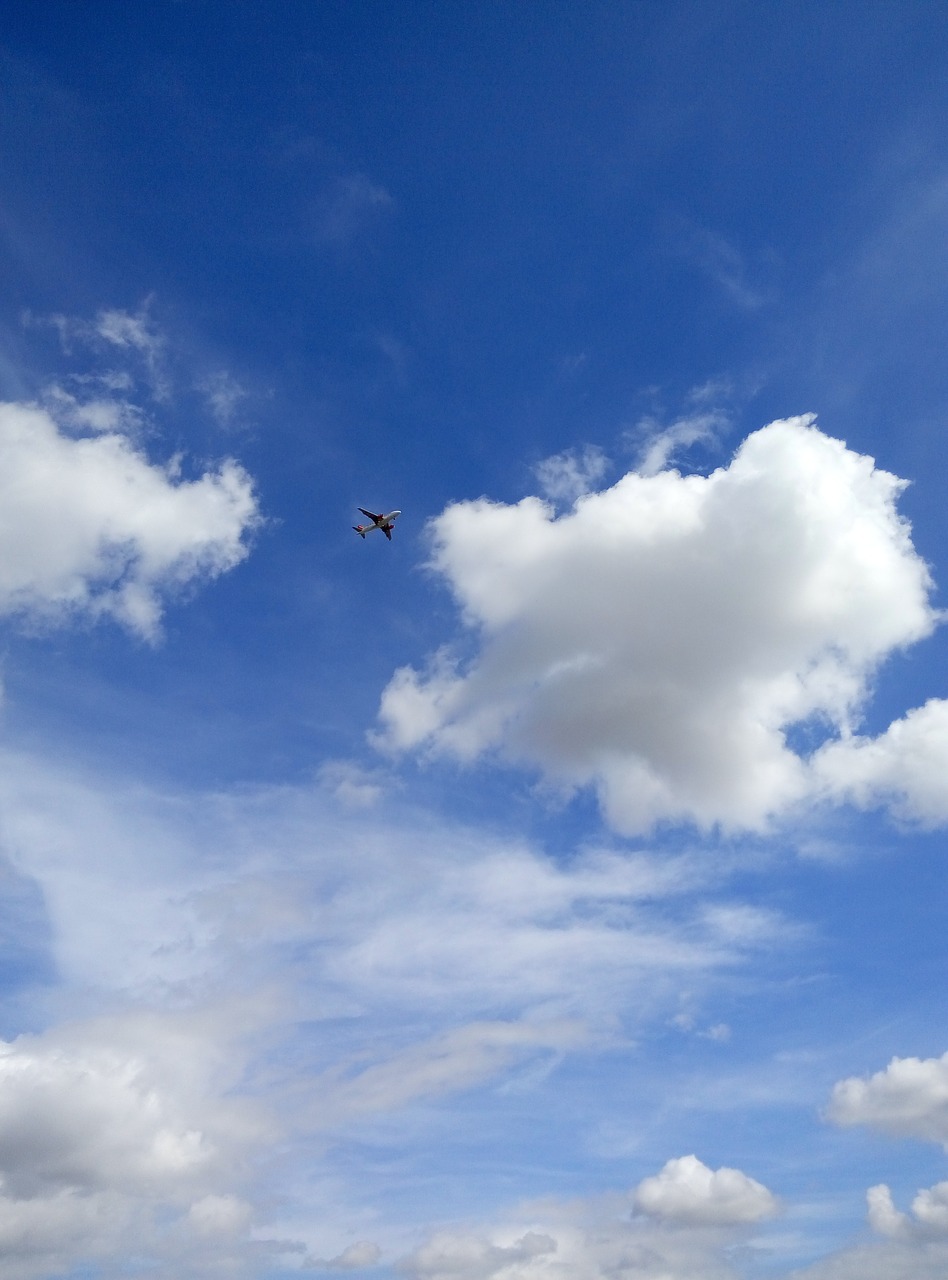 airplane blue sky clouds free photo