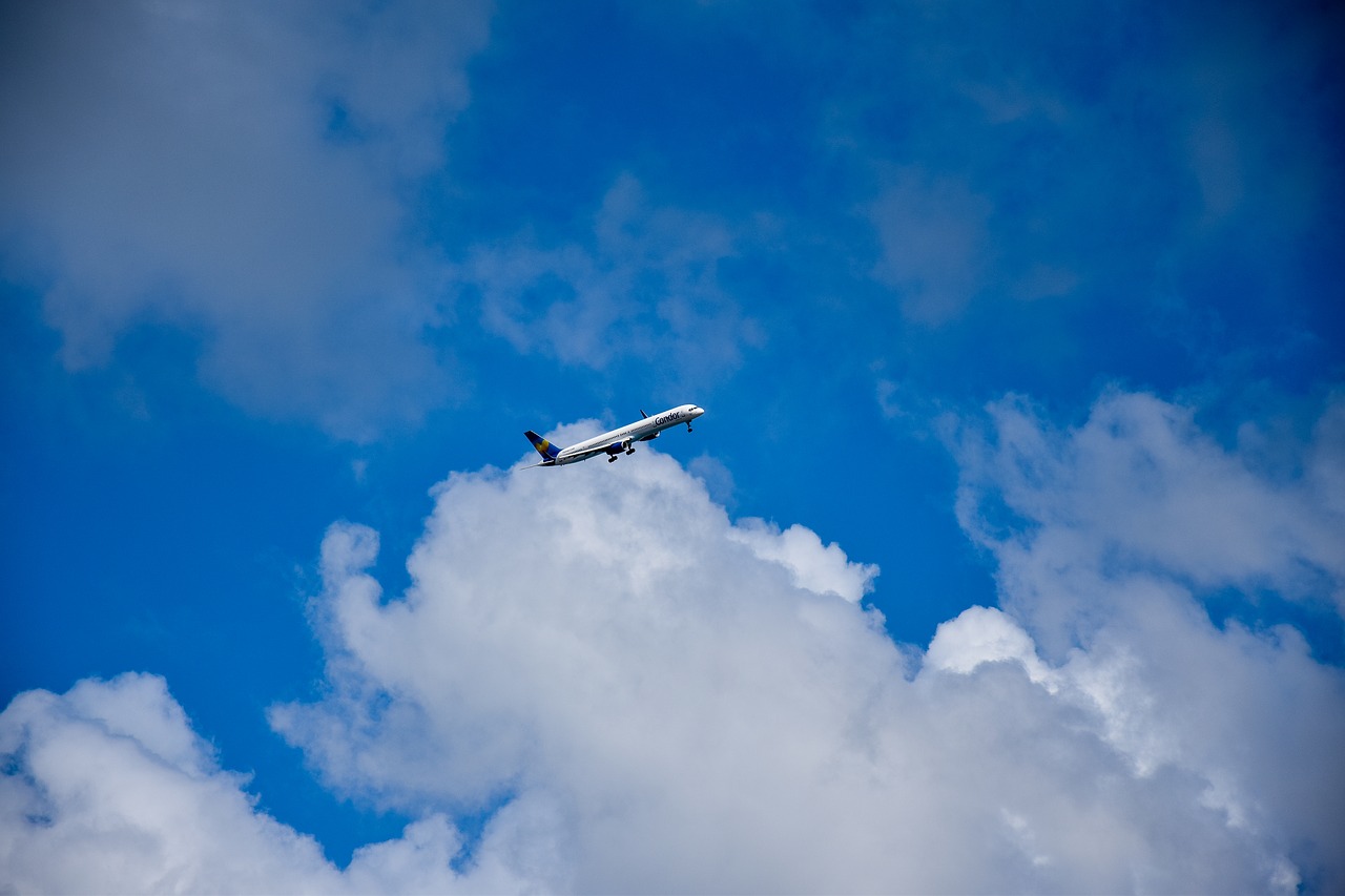 airplane blue sky clouds free photo