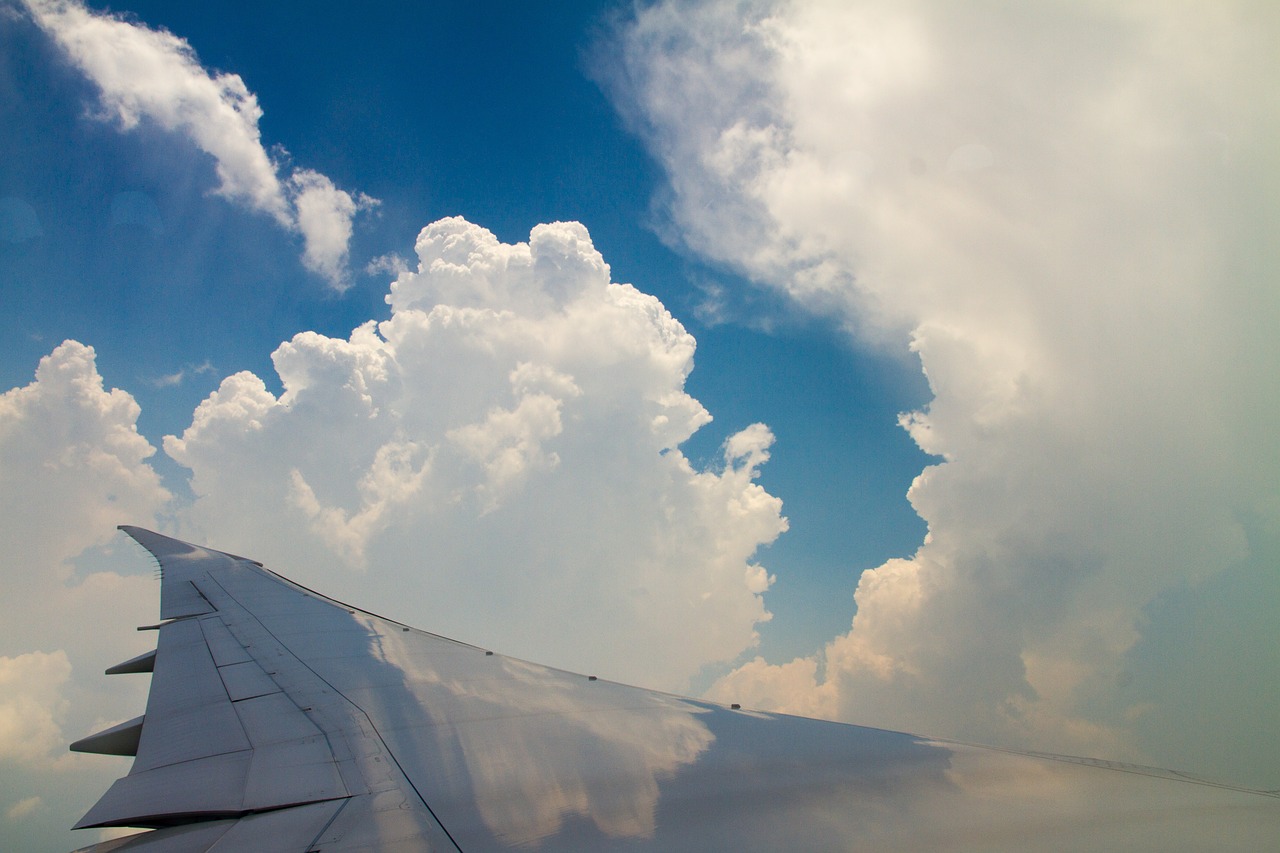 airplane sky clouds free photo