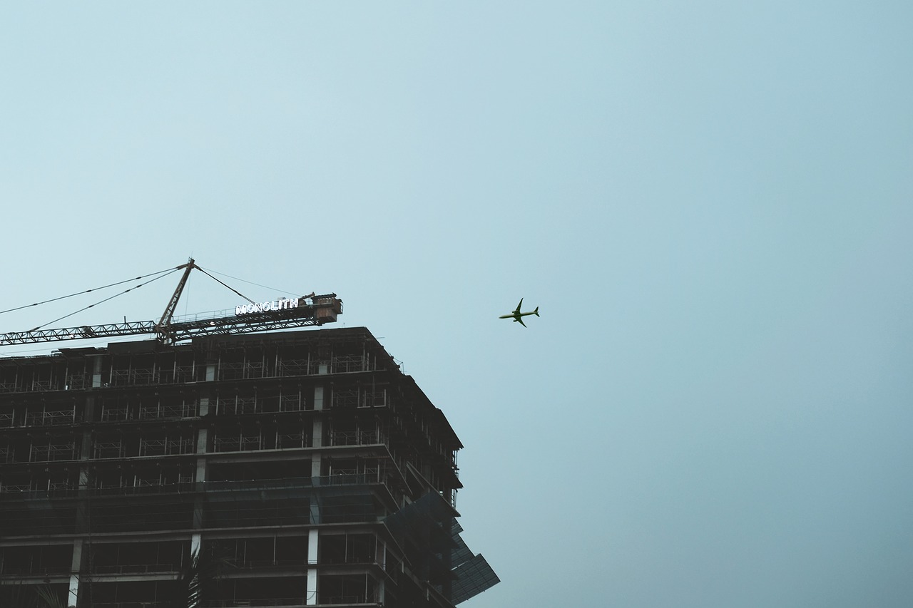 airplane sky building free photo