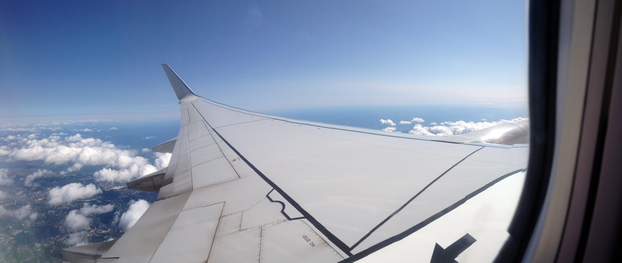 airplane wing clouds free photo