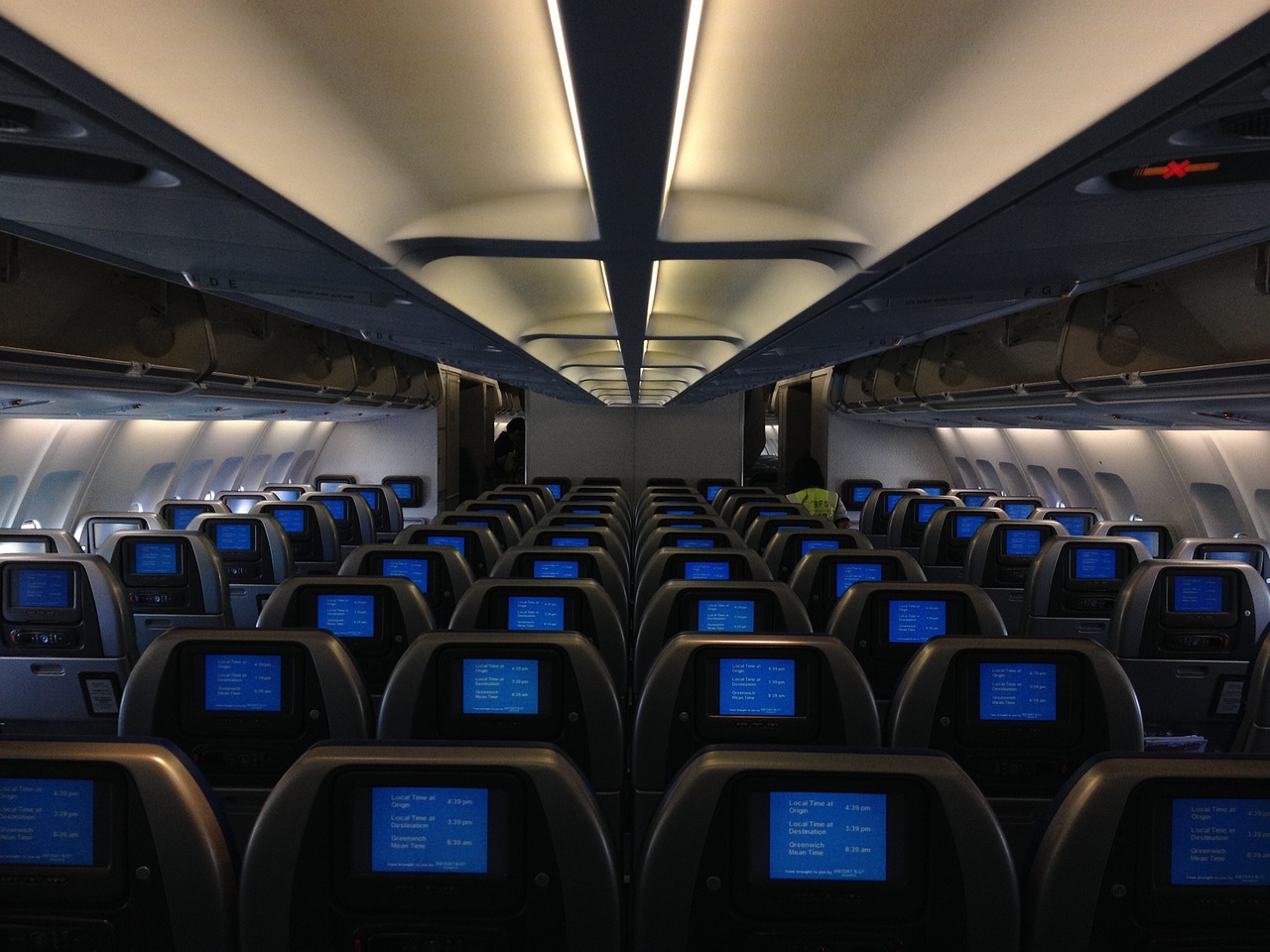 airplane cabin passenger free photo