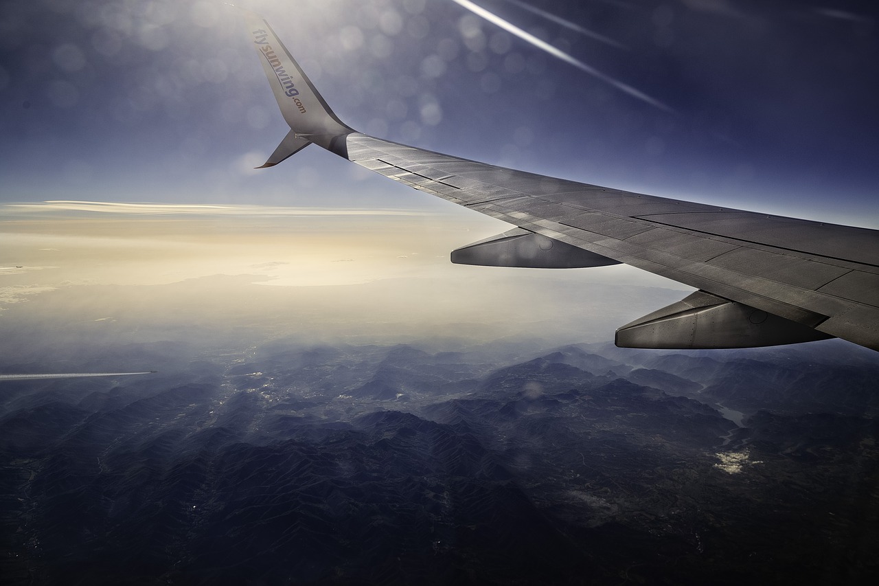 airplane wing flying free photo