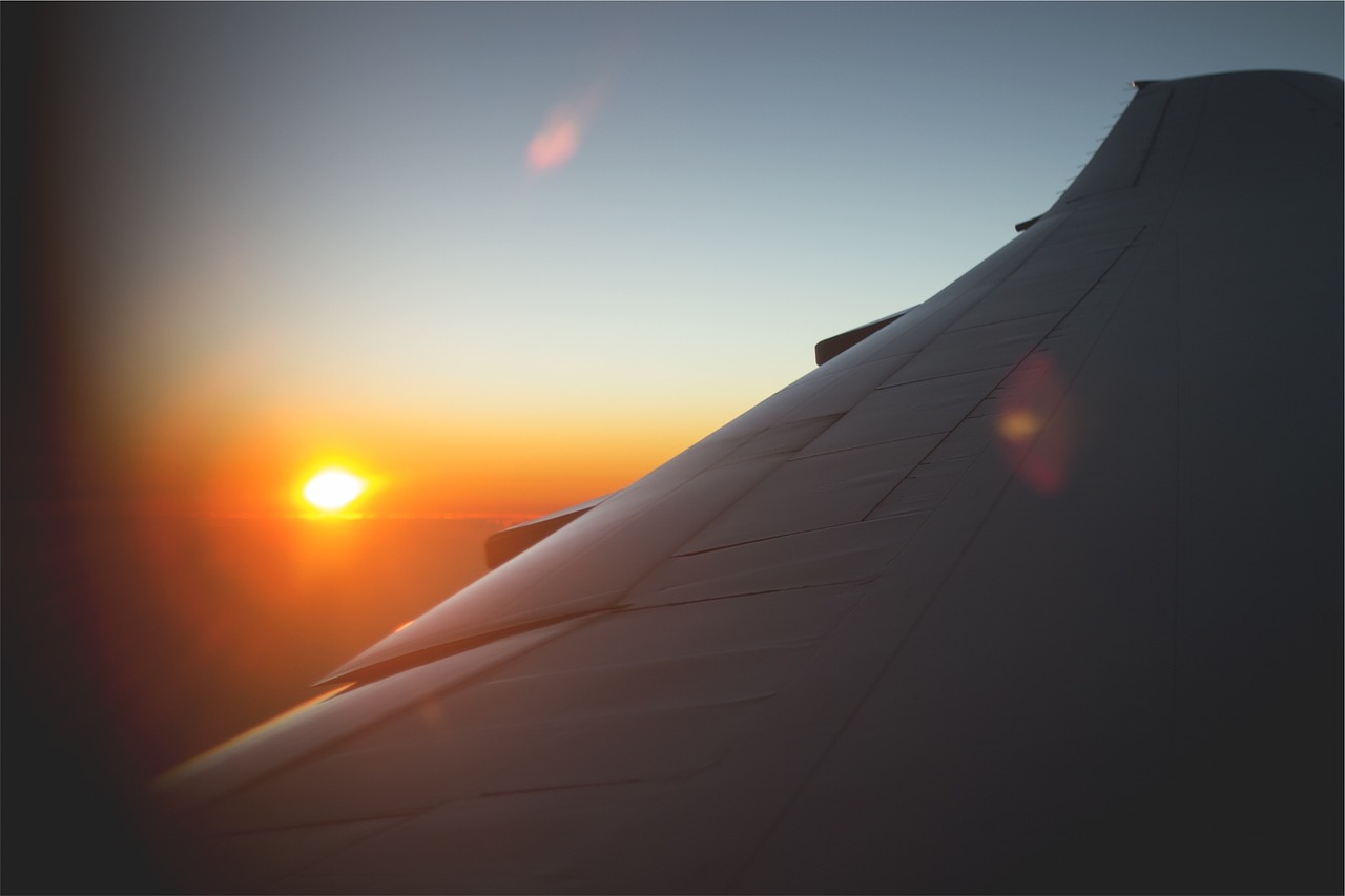 airplane wing sunset free photo