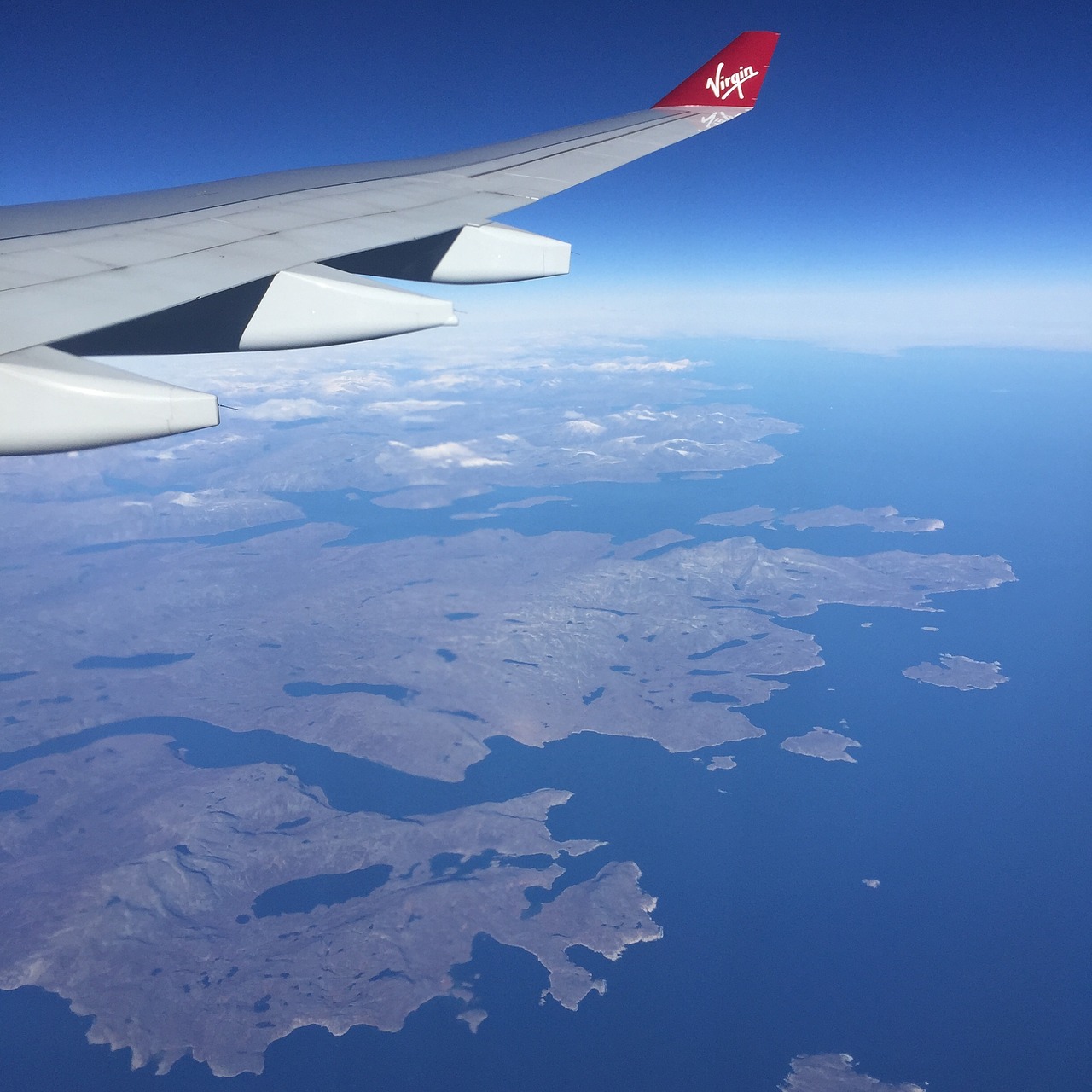 airplane canadian coast sky free photo