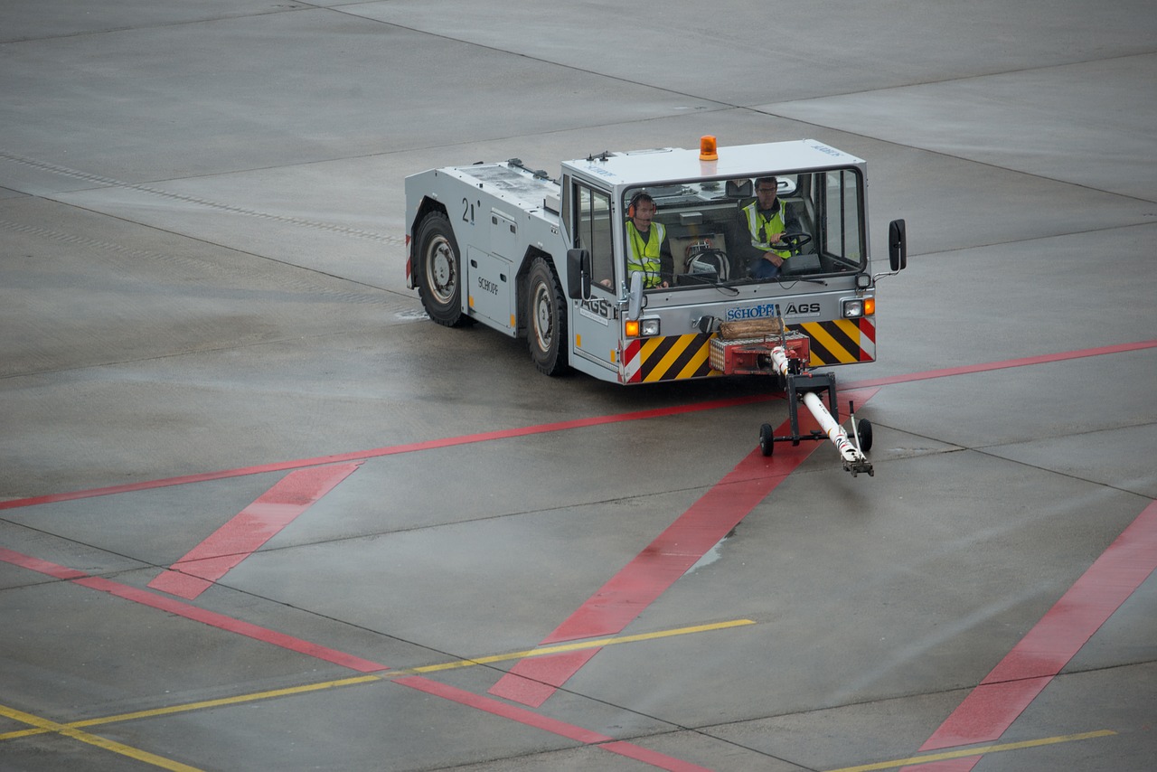 airplane tug airport prior to free photo
