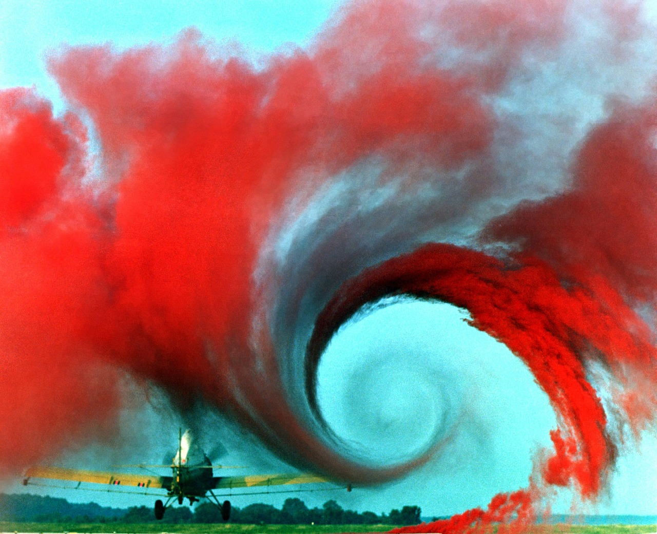 airplane vortex wings red smoke free photo