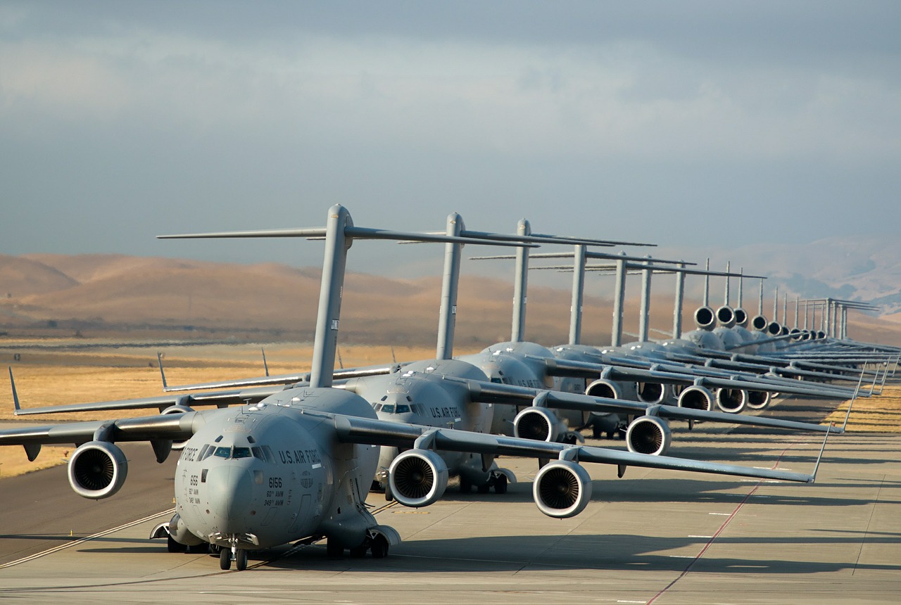 airplanes lined up takeoff free photo