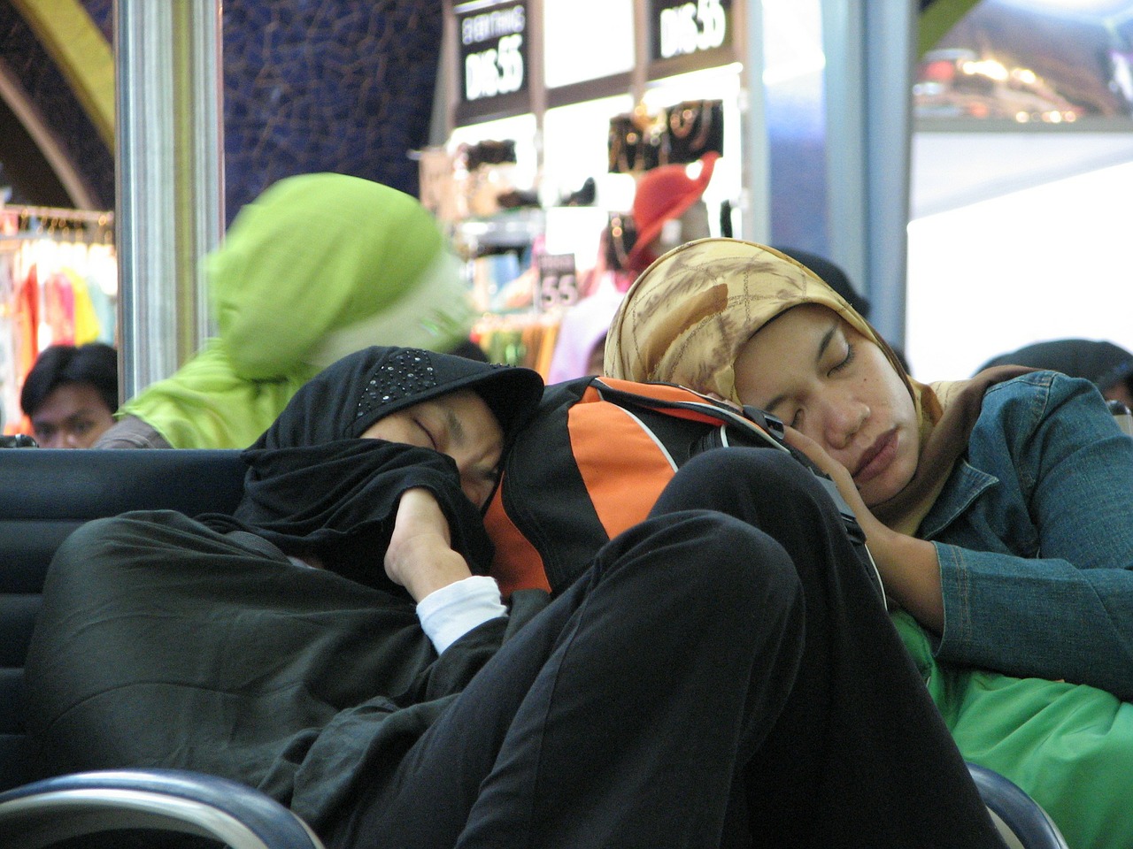 airport passenger sleeping free photo