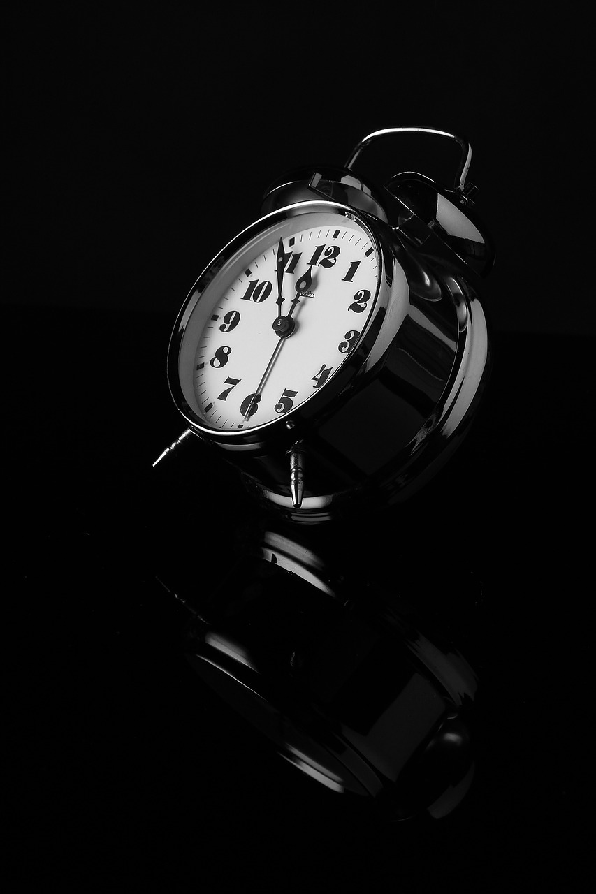 alarm clock black and white reflection free photo