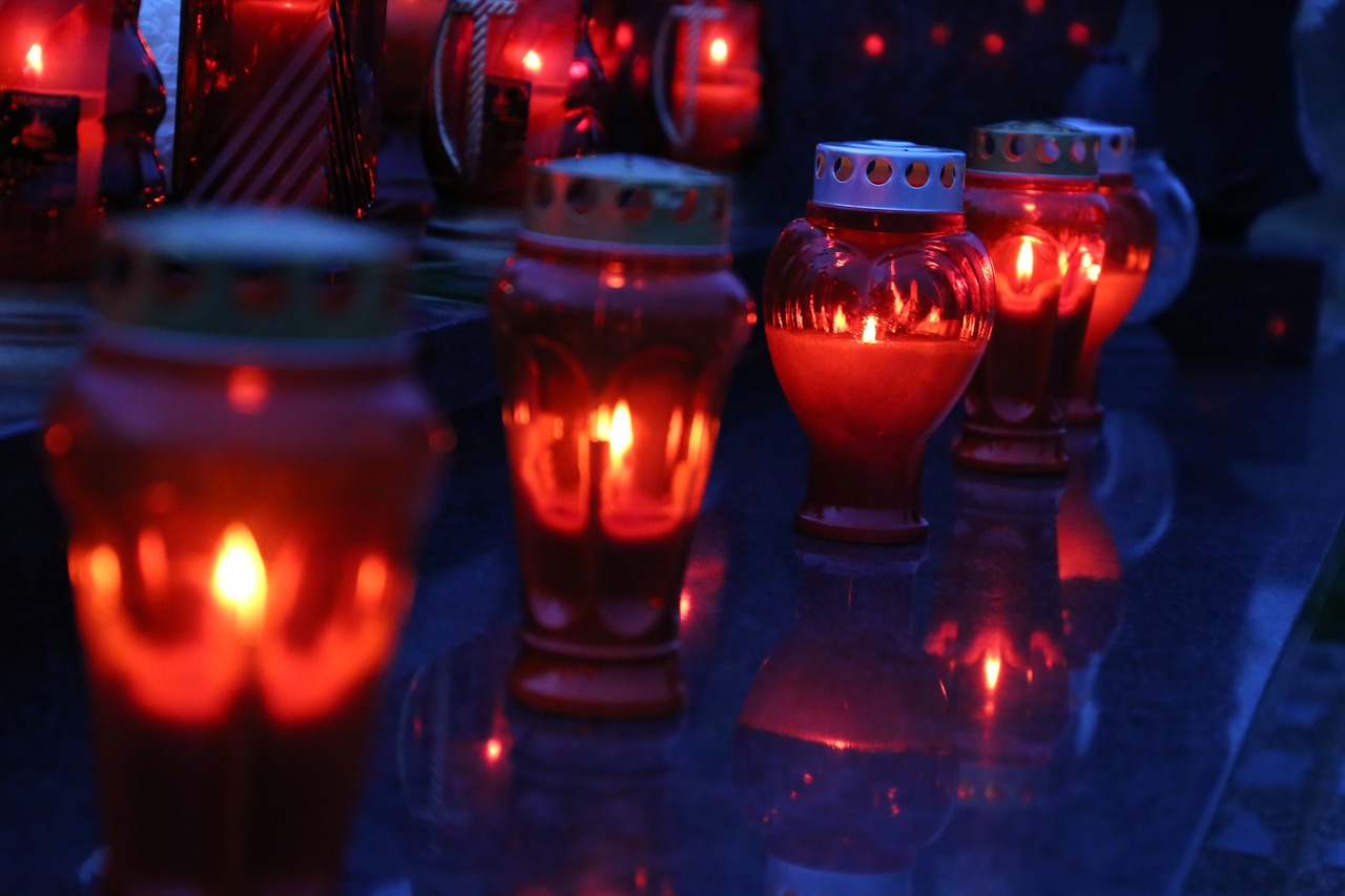 all saints  red candles  lantern free photo