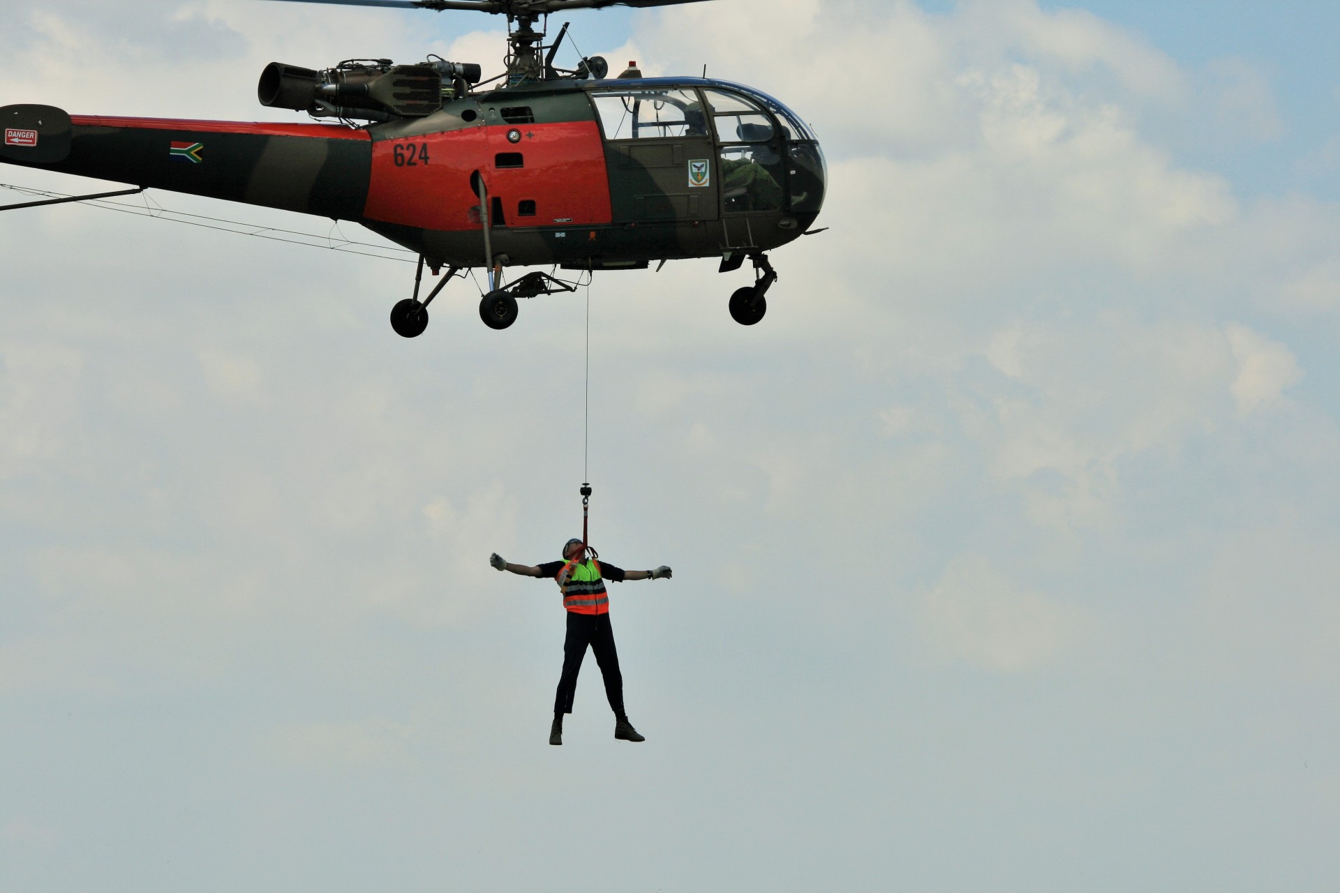 alouette iii helicopter hoisting free photo