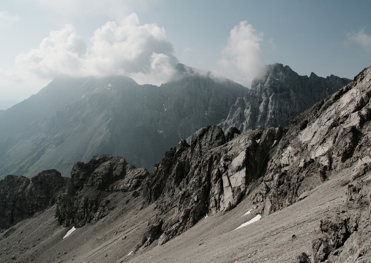 alpine mountains clouds free photo